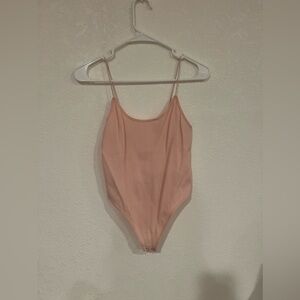Pink body suit
